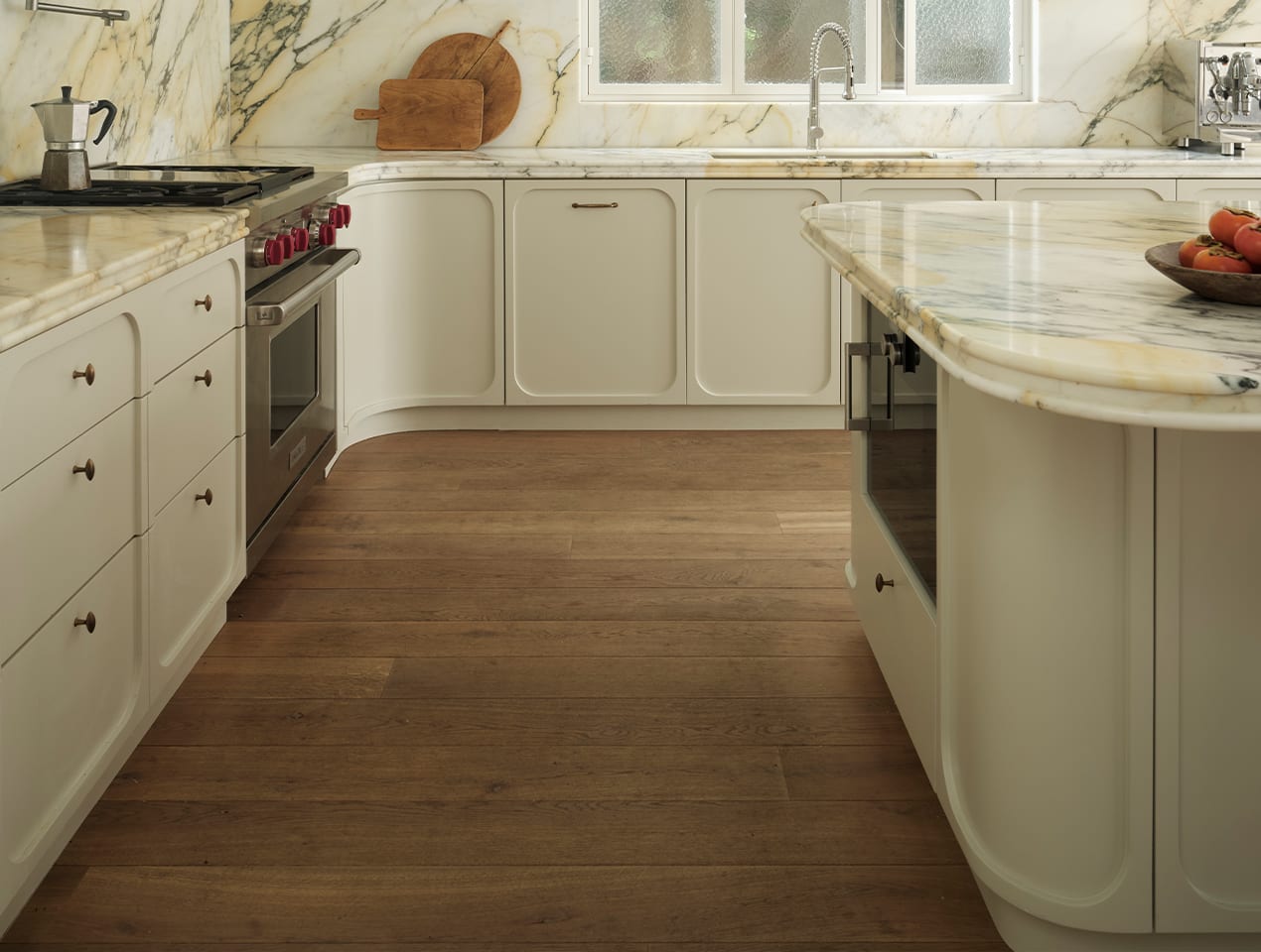 white kichen with wood floors